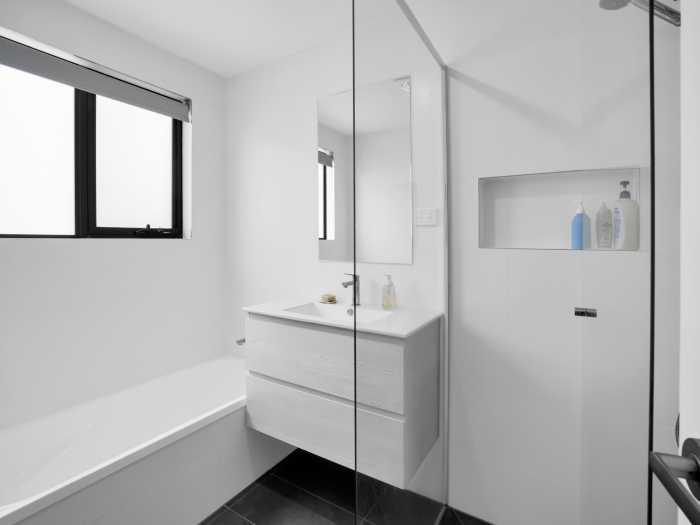 Basic White Bathroom with Freestanding Vanity